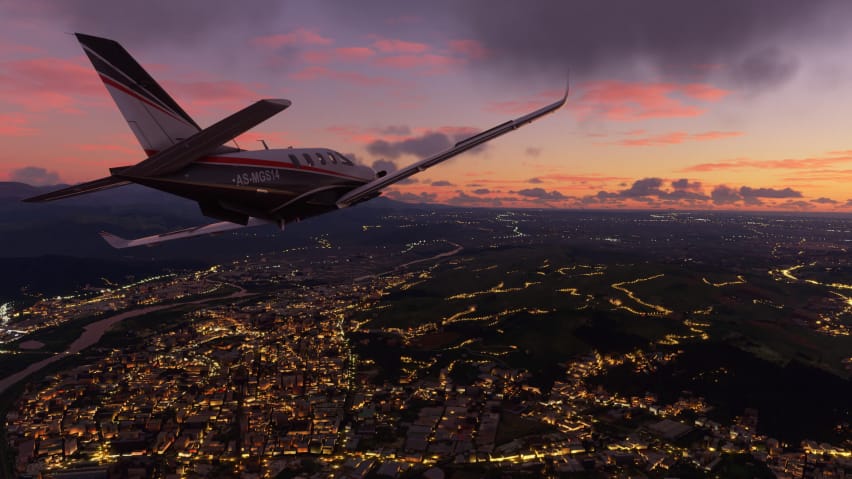 Um avião voando ao anoitecer no MIcrosoft Flight Simulator