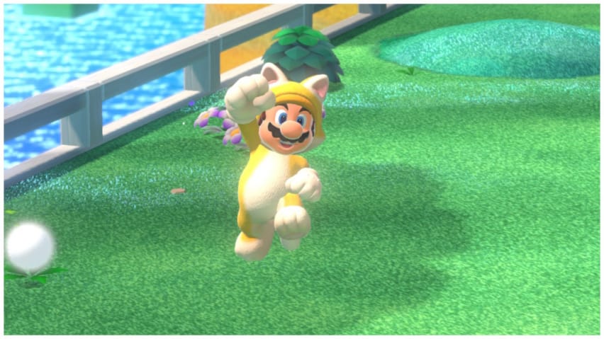 Mario con traje de gato saltando de alegría