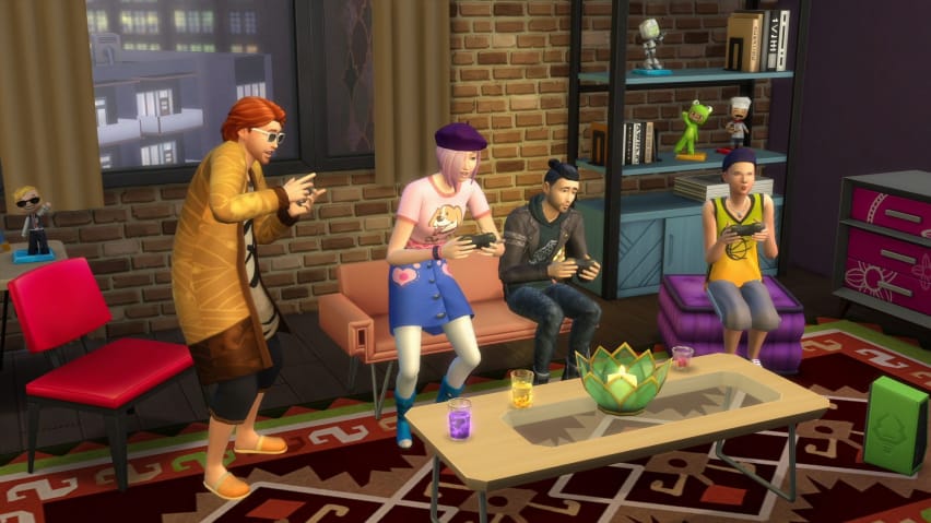 empat Sims bermain game di tv