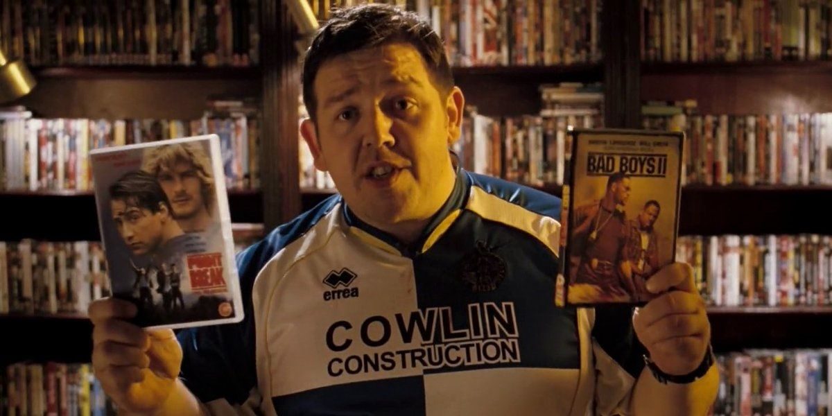danny-holding-dvds-of-point-break-and-bad-boys-ii-in-hot-fuzz-2141200