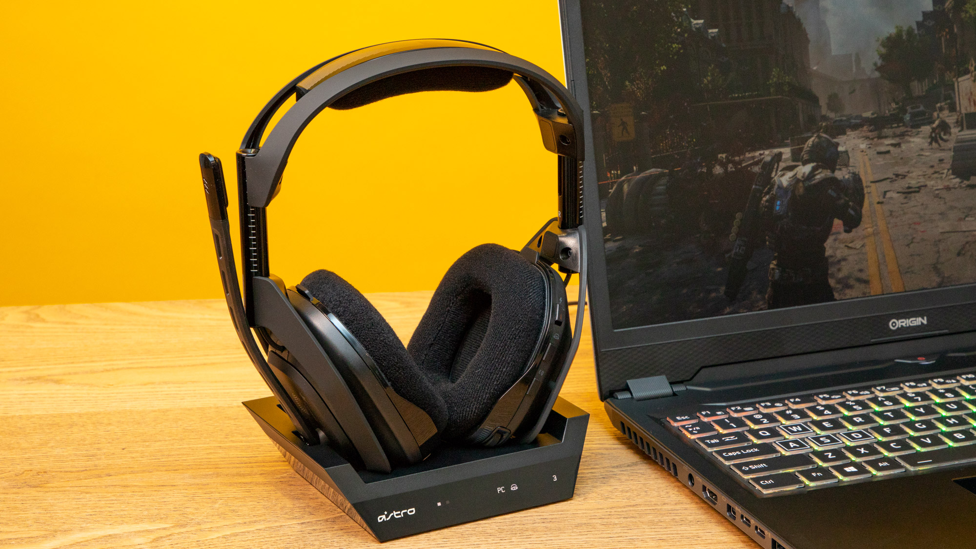 Astro A50 next to a gaming laptop