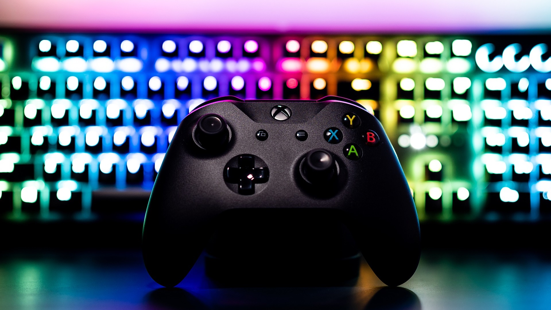 XBOX Controller in front of an RGB keyboard